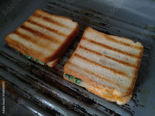 sandwiches on frying pan in the kitchen fried
