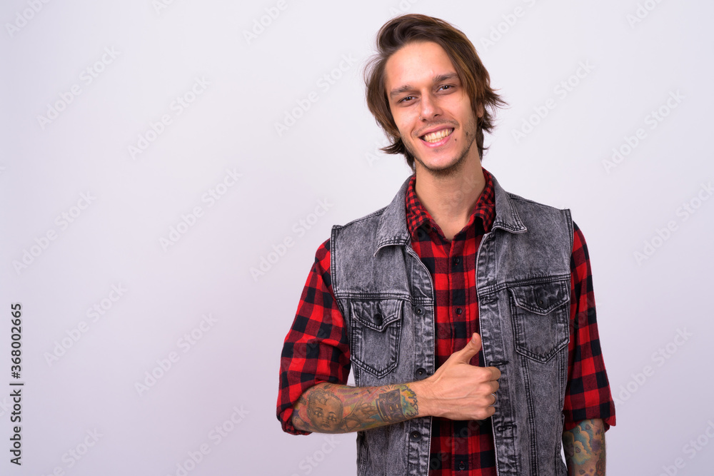 Portrait of happy young handsome rebellious man Portrait of happy young handsome rebellious man