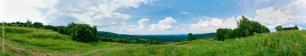 Mountain valley village landscape. Mountain valley village panorama. Mountain green valley village view