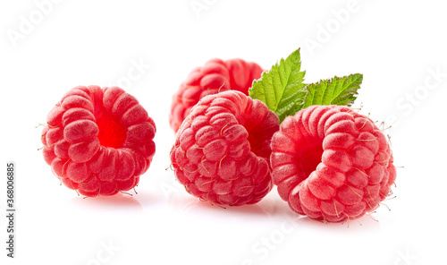 Fresh raspberry with leaves in closeup