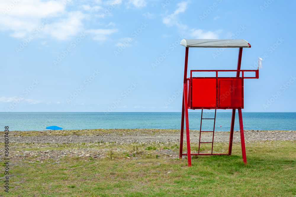 Red lifeguard rescue tower on the Anaklia beach