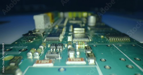 Macro shot with probe lens, green printed circuit board.
