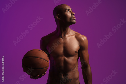 Fitness sports man holding basketball