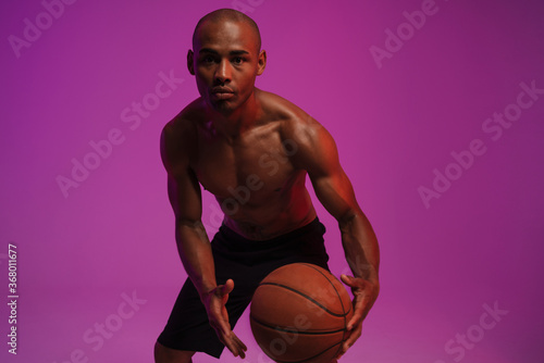 Fitness sports man playing basketball
