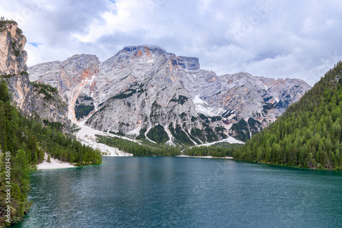 View of the famous Lake Braies at the foot of a Seekofel mountain in the Italian Alps