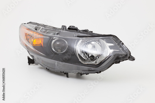 car spare part headlights on white background