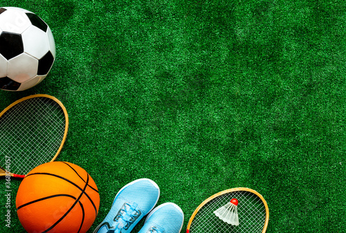 Sport games background - basketball  soccer ball  rockets  sneakers - copy space