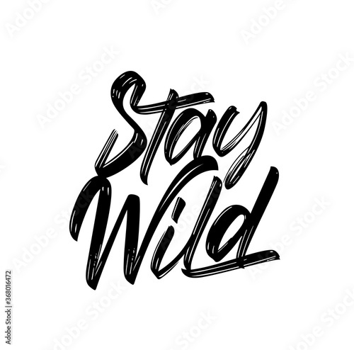 Vector handwritten calligraphic brush lettering of Stay Wild