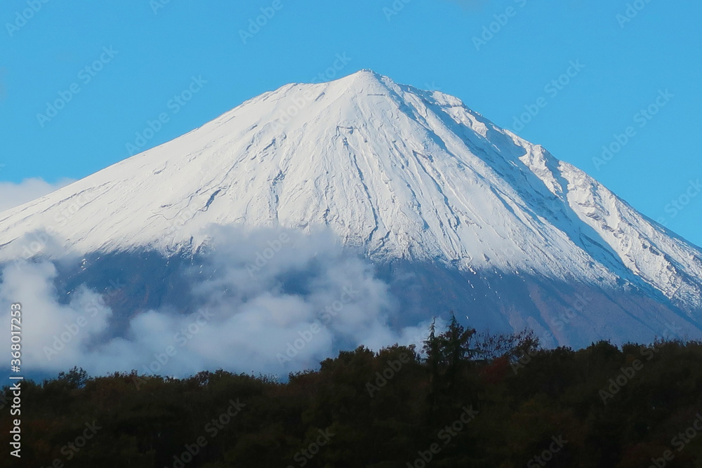 Fototapeta premium beautiful panorama blue mountain with white snow and white cloud and fantastic lake nature.