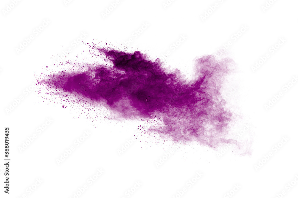 Pink powder explosion.Closeup of Pink dust particle explosion isolated on  white background.
