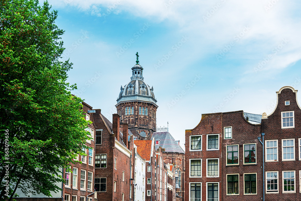 Fototapeta premium Amsterdam, Netherlands - May 23, 2018 : Street view of downtown in Amsterdam, Netherlands