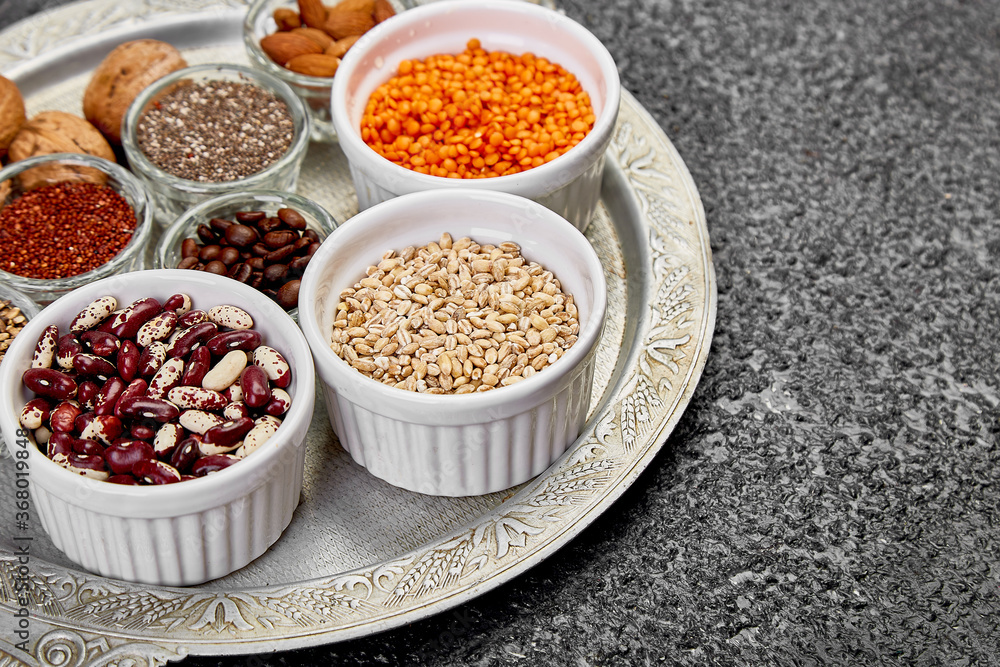 Beans and nuts selection in bowls. Healthy food