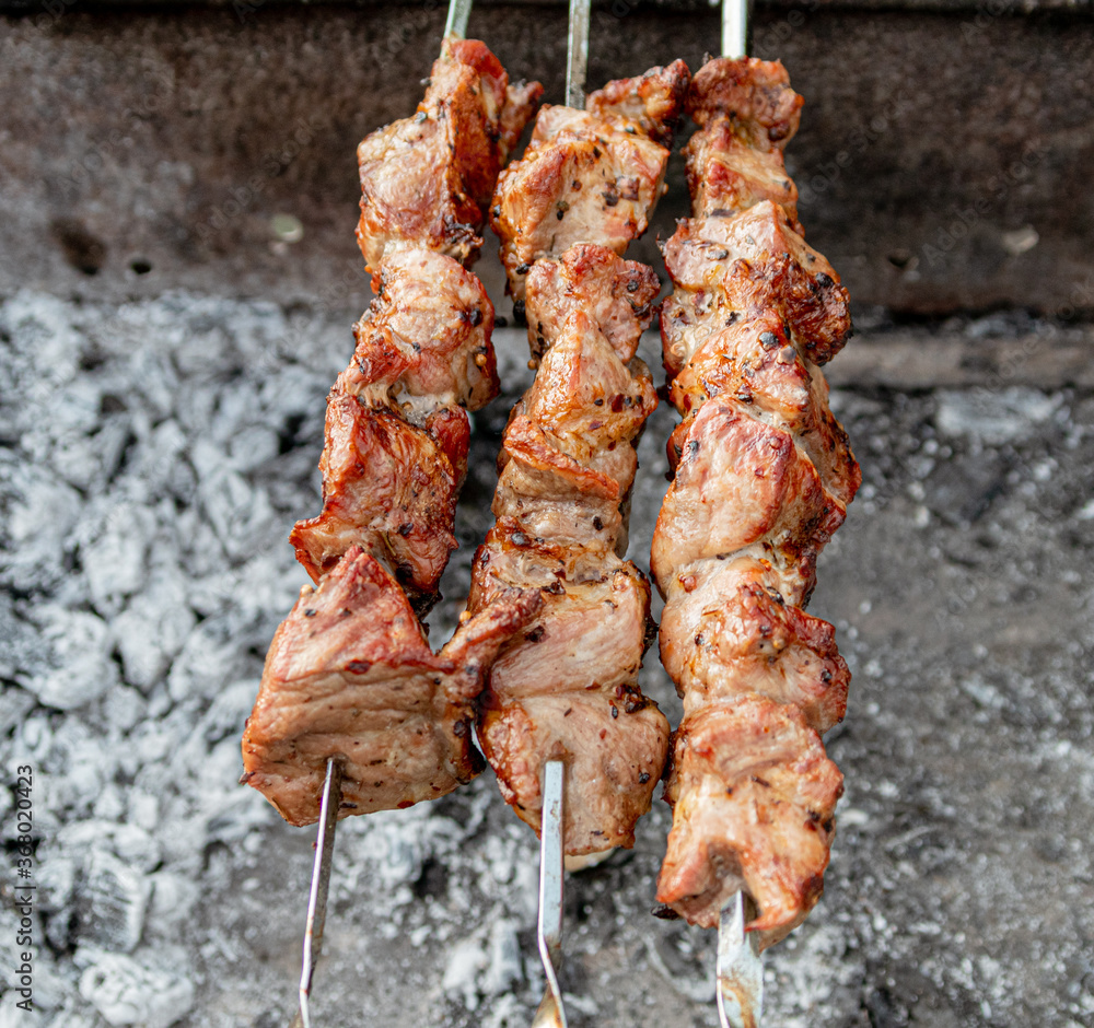 BBQ fresh beef meat chop slices. Traditional eastern dish, shish kebab. BBQ fresh beef meat chop slices. Traditional eastern dish, shish kebab.