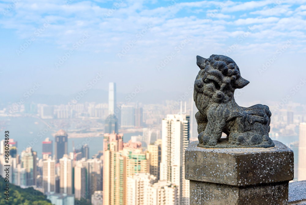Chinese Lion statue at Victoria peak the famous viewpoint and tourist attraction in Hong Kong.
