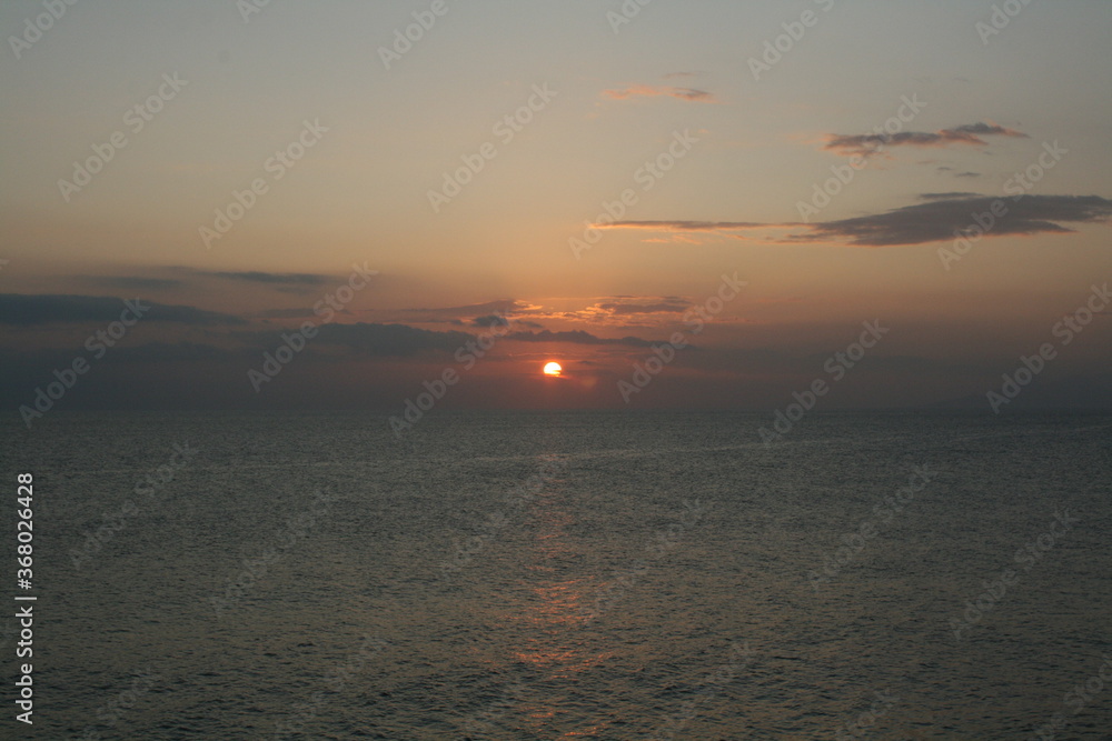 Fototapeta premium Orange Sunrise in Santorini