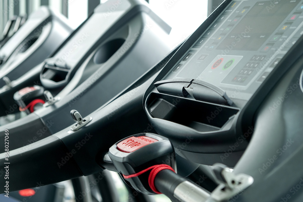 Detail image of Treadmill in fitness room background 