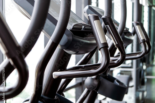 Detail image of Treadmill in fitness room background  © ponsulak