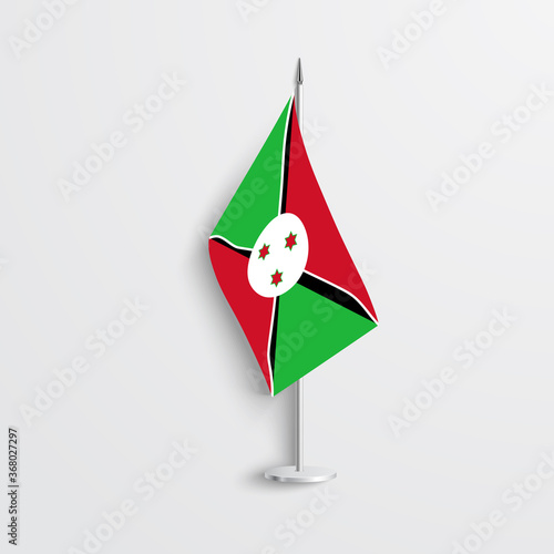 Burundi table flag on light grey background. Burundi desk flag isolated on grey background.