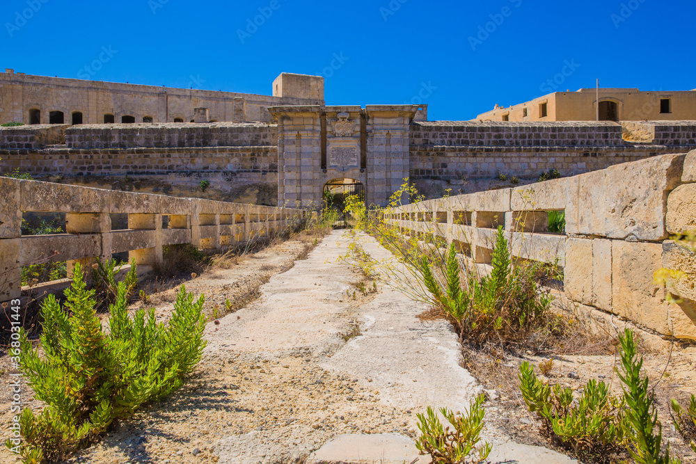 One of the many bridges in Fort Chambray, Ghajnsielem. Part of this abandoned fort is now being converted into apartments and villas, for its hosts to enjoy a panoramic view of Mgarr Harbor