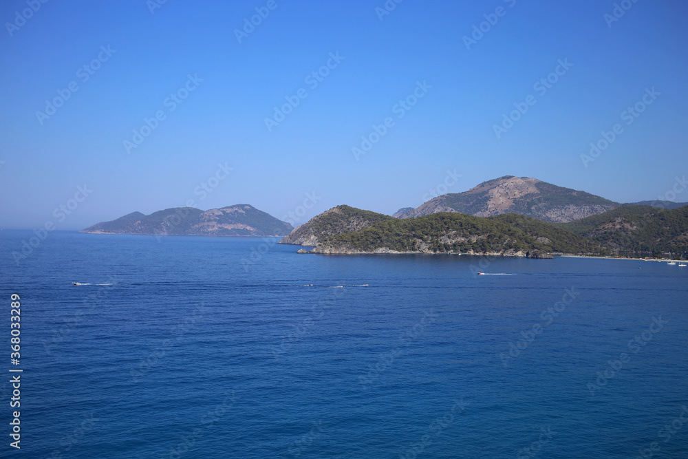 Mountains in the Mediterranean Sea and wonderful bays near the resort town of Fethiye in Turkey.