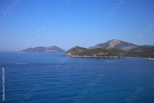 Mountains in the Mediterranean Sea and wonderful bays near the resort town of Fethiye in Turkey. © Ihor95