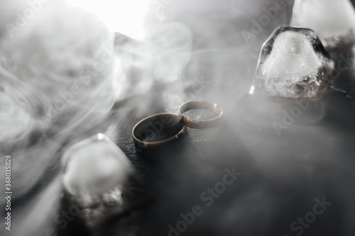 wedding rings and around cold ice