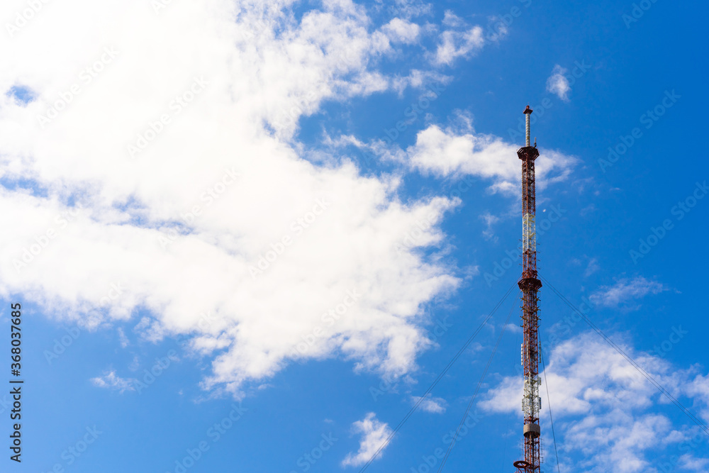 TV tower against a blue sky with clouds TV tower against a blue sky with clouds