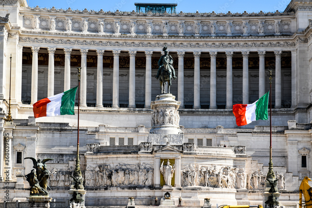 Front view of the monumental complex of the Vittoriano in the center of Rome, made of marble and bronze statues, also known as 
