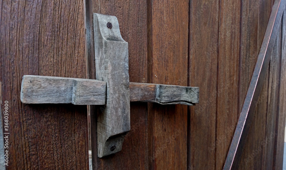 Texture of teak wood door, traditional door lock