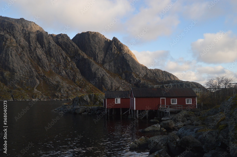 Colorful autumn refelctions and colors in the mountains on the beautiful fjords of Lofoten in Norway