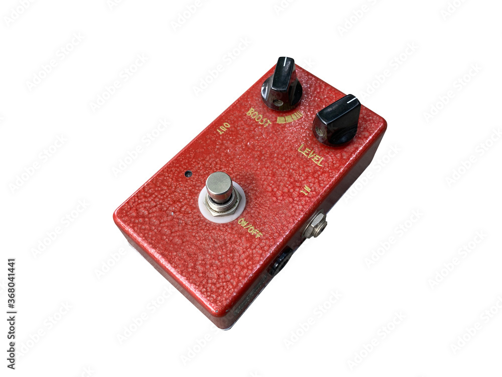 Isolated Red overdrive British sound style stompbox electric guitar effect for studio and stage performed on white background with clipping path. side view photo. music concept. Isolated Red overdrive British sound style stompbox electric guitar effect for studio and stage performed on white background with clipping path. side view photo. music concept.