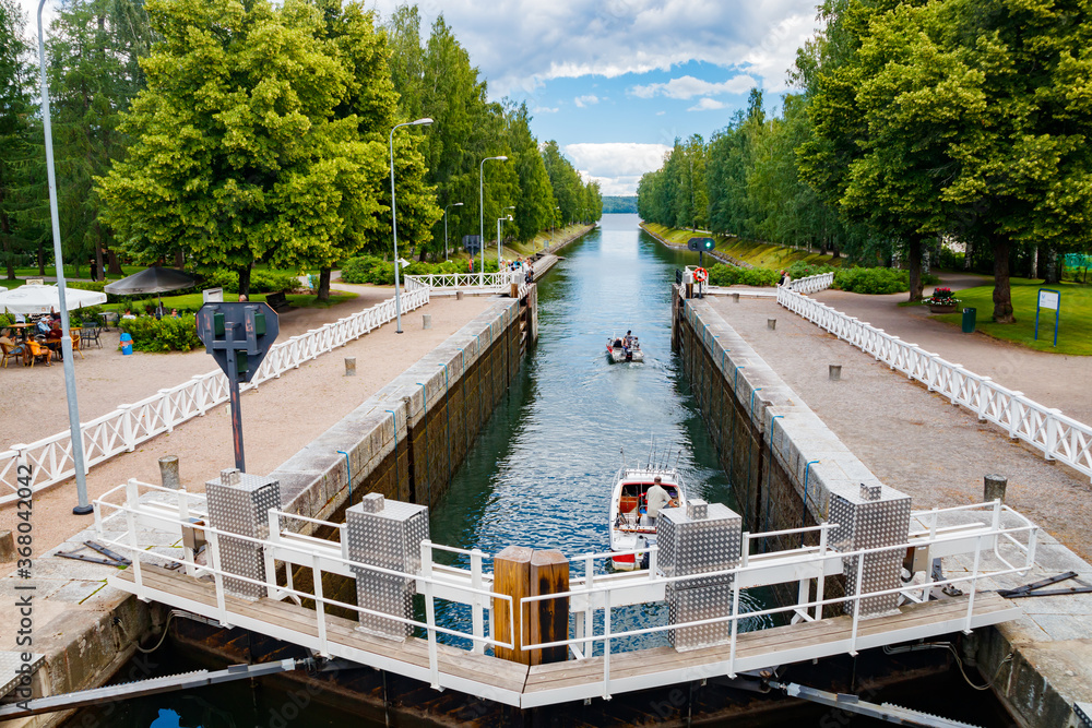 Asikkala, Finland - 16 July 2020: Vaaksy Canal between two big lakes Vesijarvi and Paijanne. Gateway is open for boats going though.