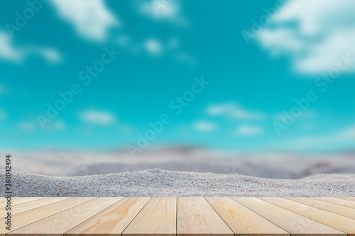 Plank flooring on the sea blurred background