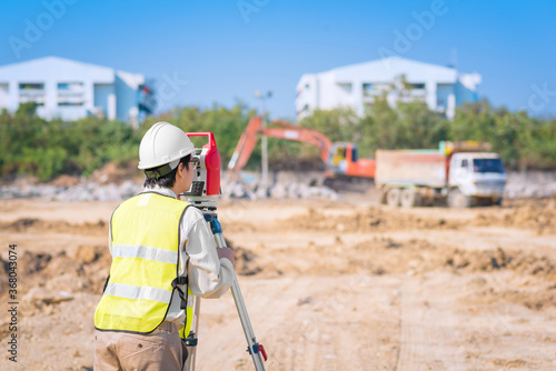 Asian construction engineer checking construction site for new Infrastructure project. photo concept for engineering work.