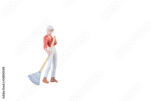 Close up of Miniature farmer people isolated with clipping path on white background . Elegant Design with copy space for placement your text, mock up for farmer and gradening concept. photo