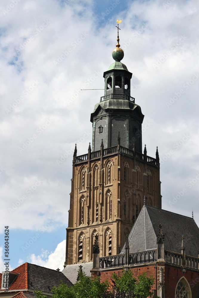 The tower of the Saint-Walburgis Church in Dutch city of, Zutphen, the Netherlands in summertime. The tower of the Saint-Walburgis Church in Dutch city of, Zutphen, the Netherlands in summertime.