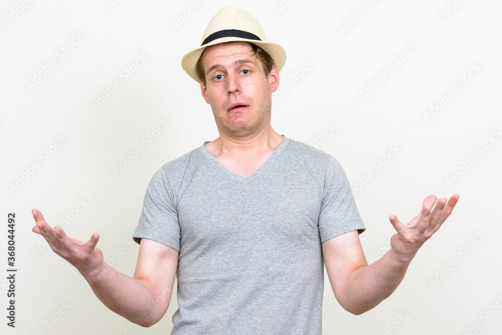 Portrait of young handsome tourist man ready for vacation Portrait of young handsome tourist man ready for vacation
