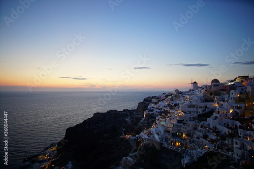 Beautiful town of Santorini island at twilight, sunset time, Oia, Greece, Europe