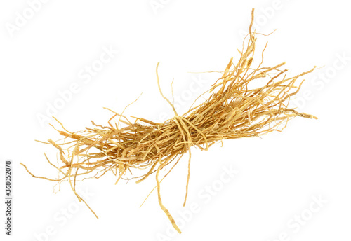 Closeup on Vetiver Root Bunch. Isolated on White Background. photo