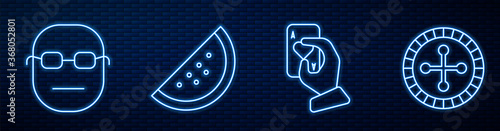 Set line Hand holding playing cards, Poker player, Casino slot machine with watermelon and Casino roulette wheel. Glowing neon icon on brick wall. Vector.