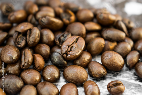 Roasted coffee beans close up. Coffee concept
