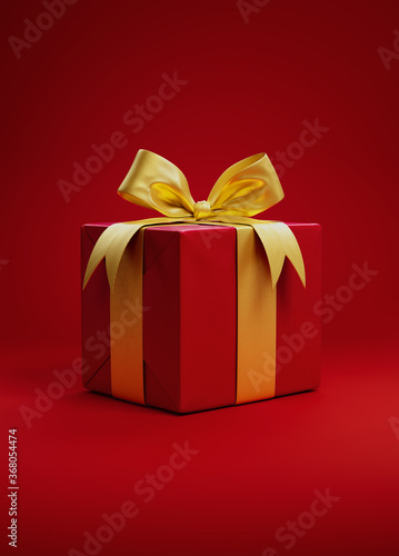 Red gift with ribbon and bow-knot on a red background. High quality expensive present. Birtday, Christmas, Valentine's day. Luxury