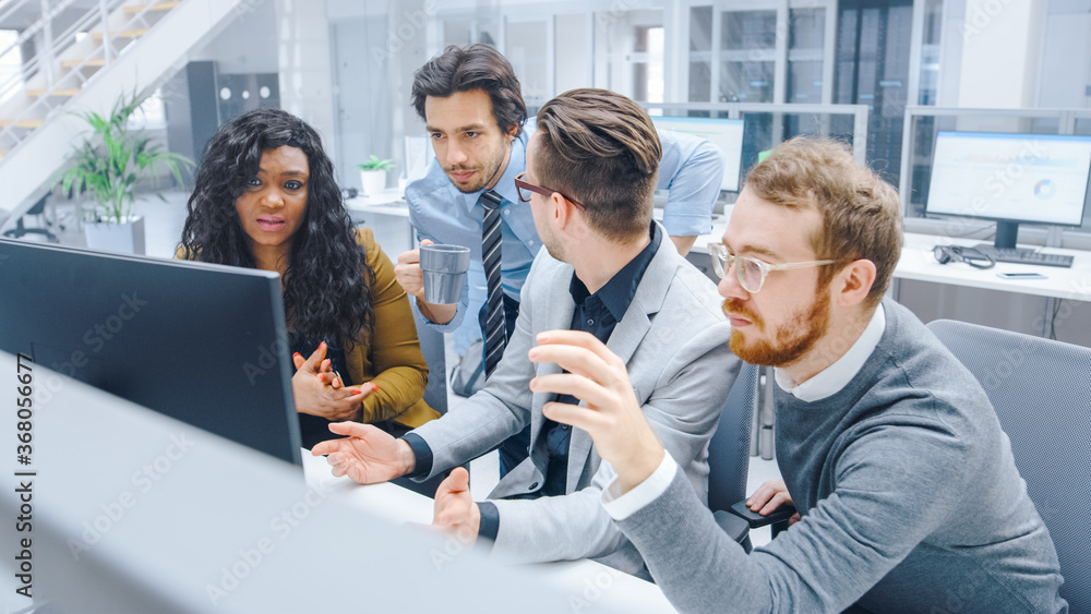 Obraz premium In Modern Office: Diverse Team of Young Motivated Businessmen and Businesswoman Work on Computer, Having Discussion, Finding Problem Solution Collectively. Ambitious Businesspeople Successful Teamwork