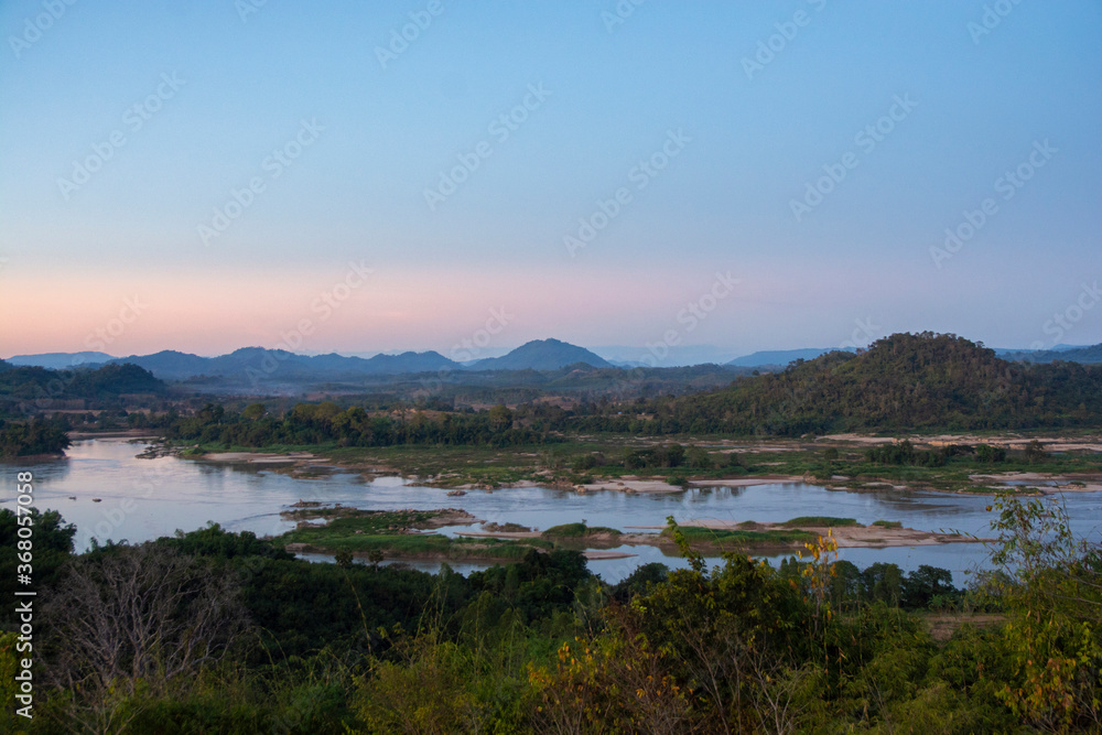 View of the Mekong River with mountain and forest border of Thailand and Laos, NongKhai province,Thailand.