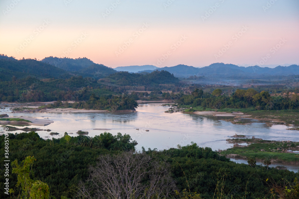 View of the Mekong River with mountain and forest border of Thailand and Laos, NongKhai province,Thailand.