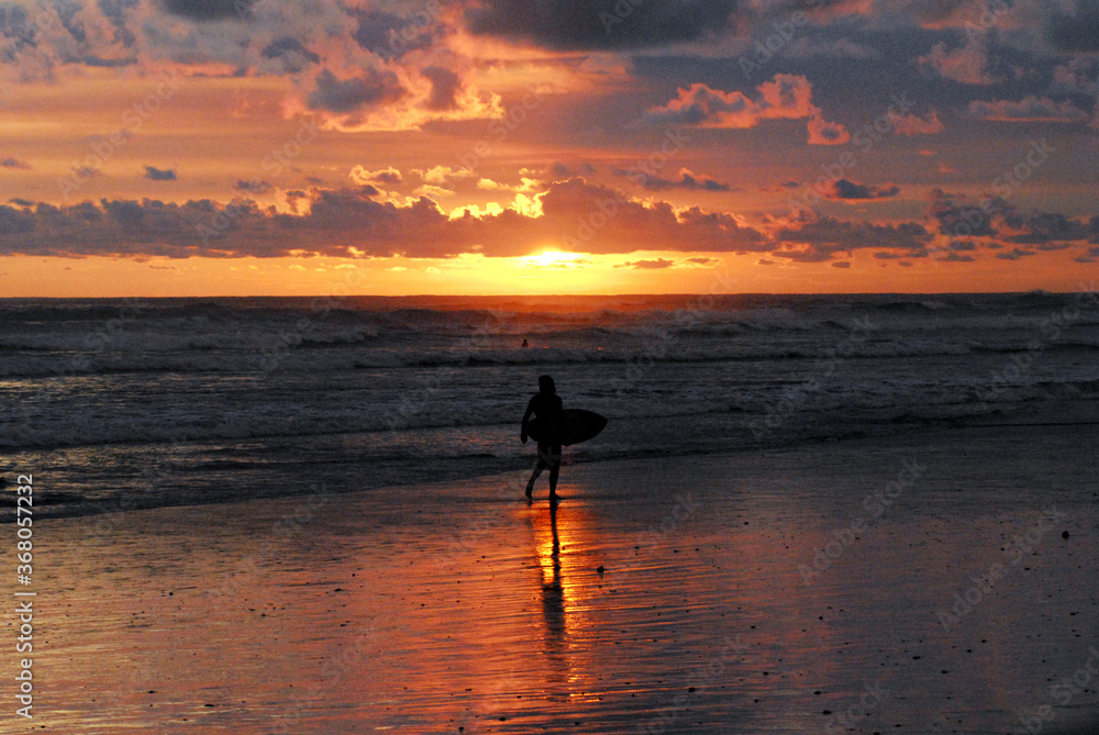 Costa Rica- Surfer in Sunrise Silhouette