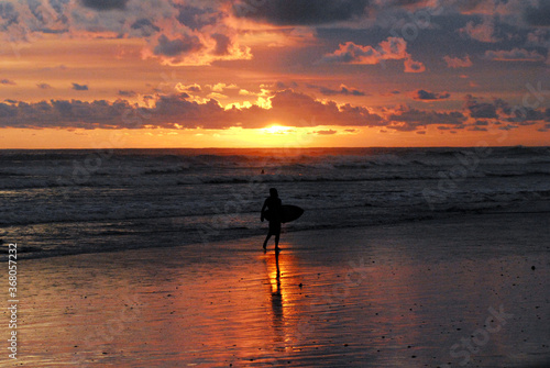 Costa Rica- Surfer in Sunrise Silhouette