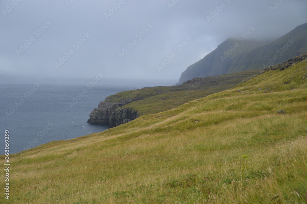 The dramatic coast and mountain landscapes of the Faroe Islands The dramatic coast and mountain landscapes of the Faroe Islands