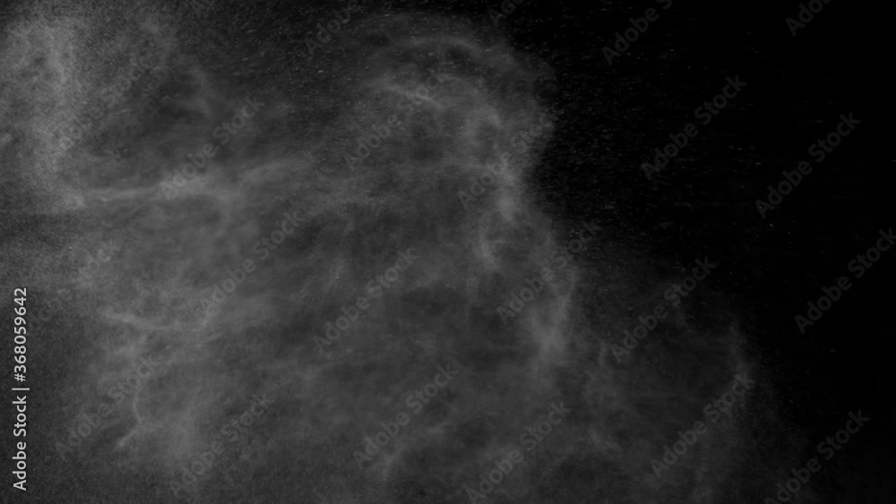 Super Slow Motion Shot of Atmospheric Particle Background Isolated on Black at 1000 fps.