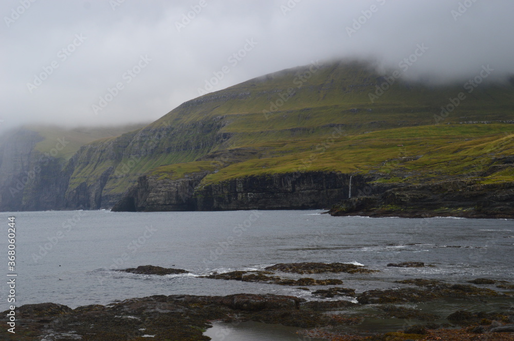 The dramatic coast and mountain landscapes of the Faroe Islands